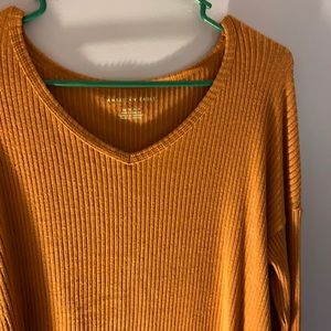 A dark orange sweater from American Eagle.